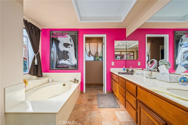 bathroom featuring a tub to relax in and vanity