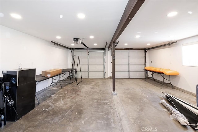 garage featuring a garage door opener