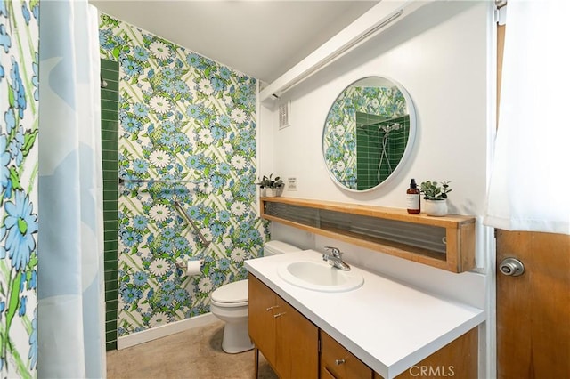 bathroom with vanity and toilet