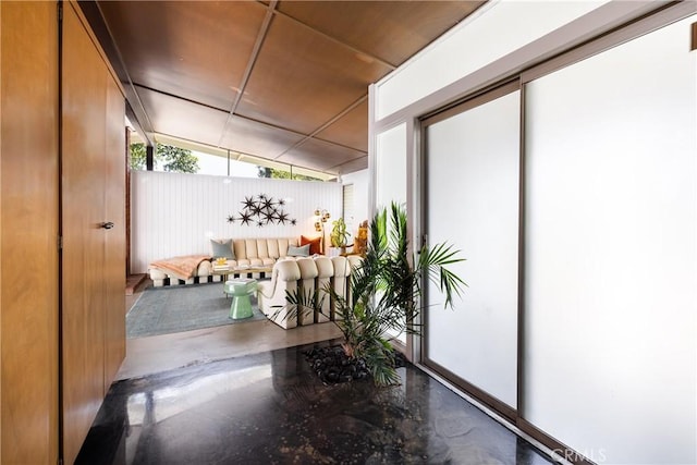 interior space featuring vaulted ceiling and wooden ceiling