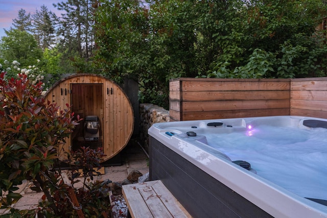 exterior space featuring a hot tub