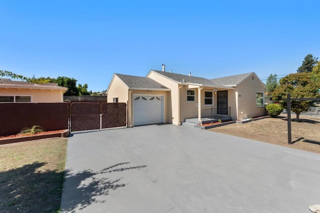 single story home featuring a garage