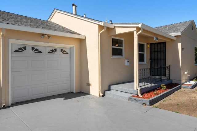 ranch-style home with a garage