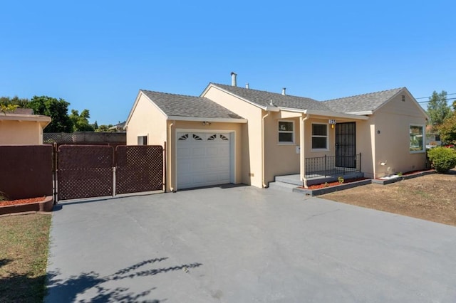 single story home featuring a garage