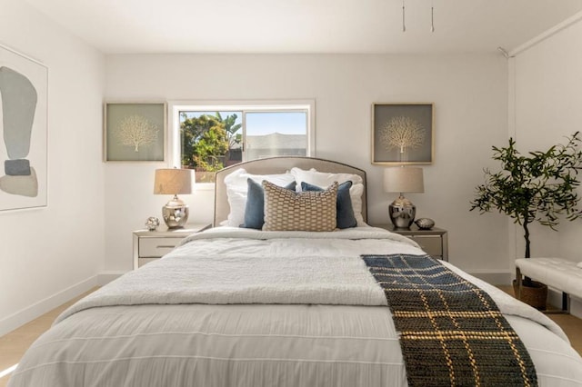 bedroom featuring light hardwood / wood-style flooring