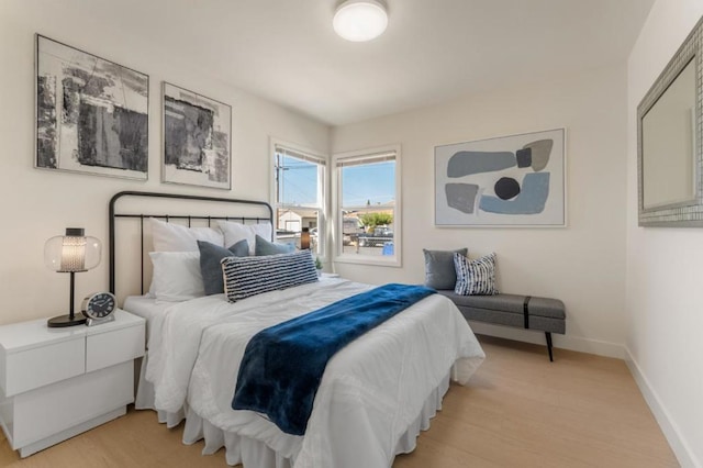 bedroom with light wood-type flooring