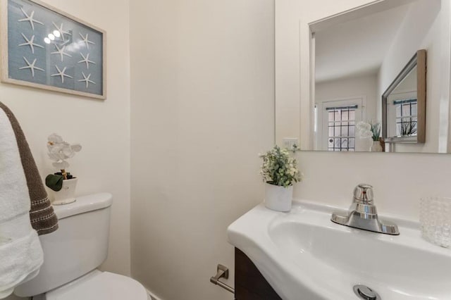 bathroom with sink and toilet