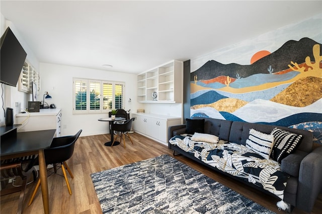 bedroom with hardwood / wood-style flooring