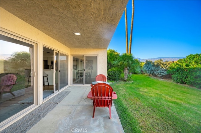 view of patio featuring a mountain view