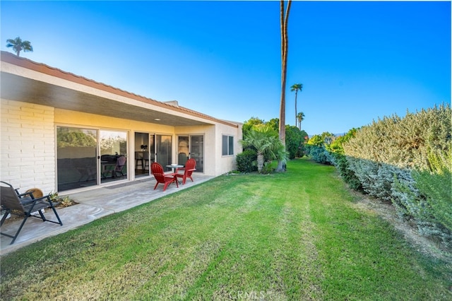 view of yard with a patio