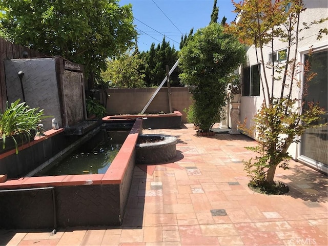 view of patio featuring a fenced backyard