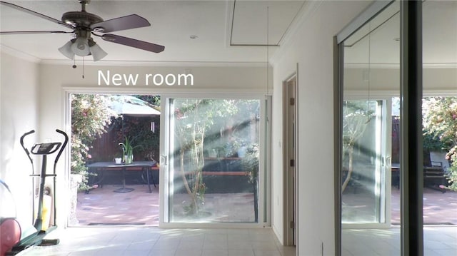 doorway with a healthy amount of sunlight, a ceiling fan, and ornamental molding