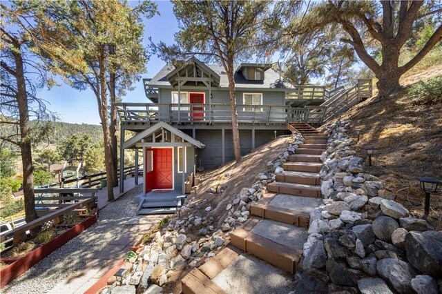 view of front of house with a deck