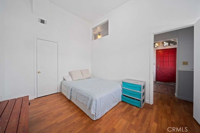 bedroom with wood-type flooring