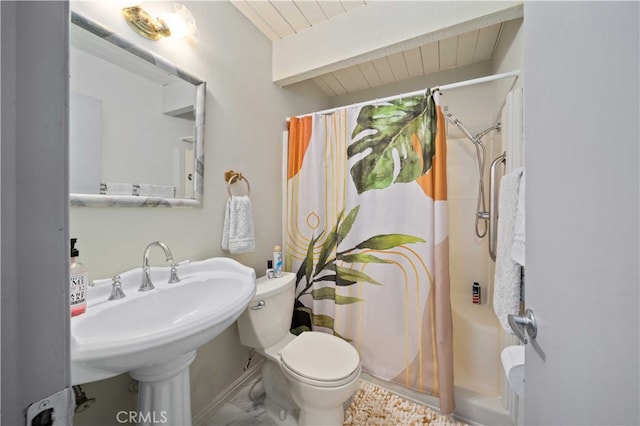 bathroom featuring curtained shower, wood ceiling, beam ceiling, and toilet