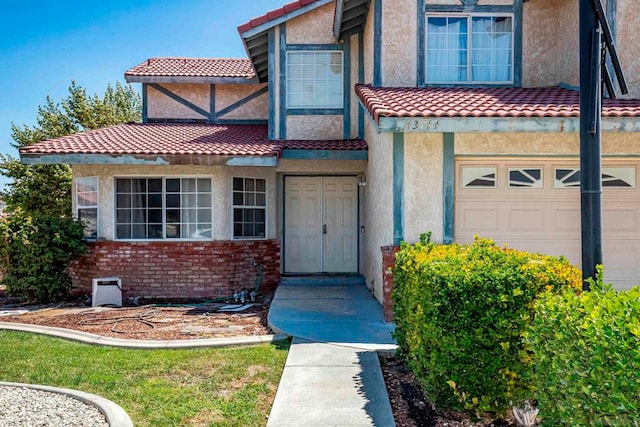 property entrance featuring a garage