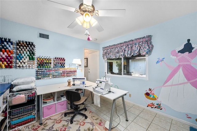 office space with ceiling fan and light tile patterned floors