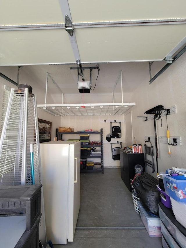 garage featuring a garage door opener