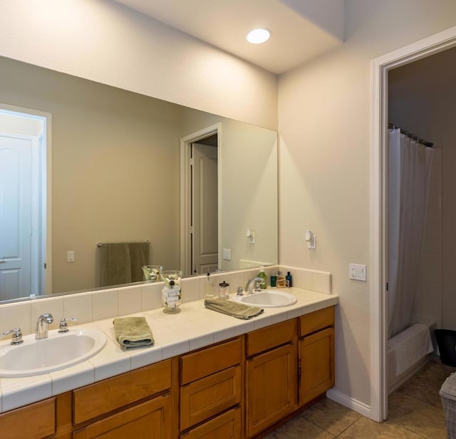 bathroom with tile patterned flooring, vanity, and a shower with shower curtain