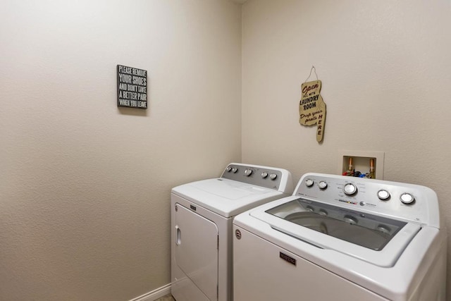 laundry room featuring independent washer and dryer