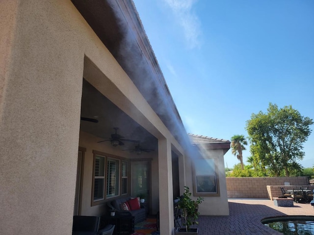 view of patio / terrace with ceiling fan