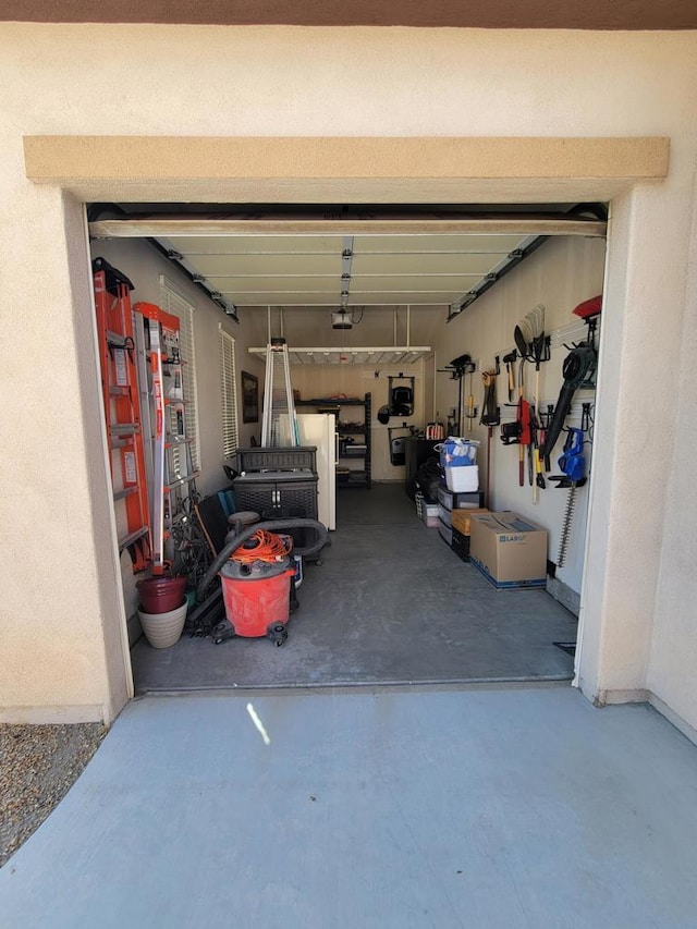 garage featuring a garage door opener