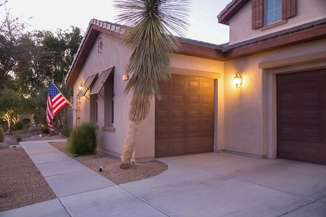 property entrance featuring a garage