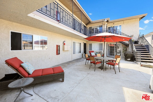 view of patio with a balcony