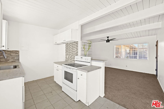 kitchen featuring tasteful backsplash, sink, white cabinets, light carpet, and white electric stove