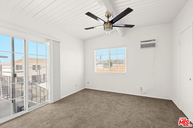 empty room featuring carpet, lofted ceiling with beams, ceiling fan, and a wall unit AC