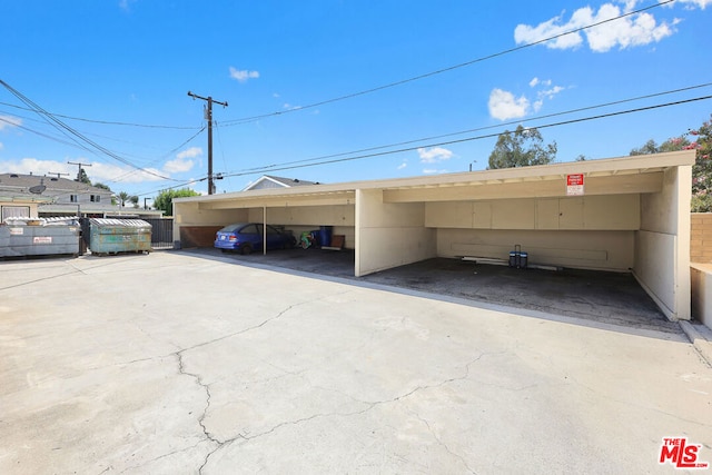 view of parking featuring a carport