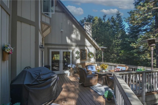 deck featuring grilling area and french doors