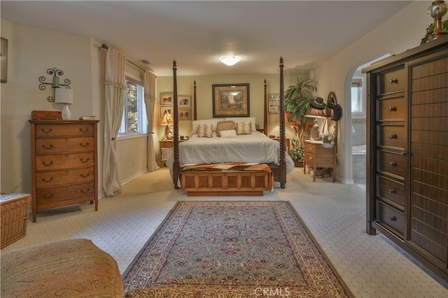 bedroom with light carpet