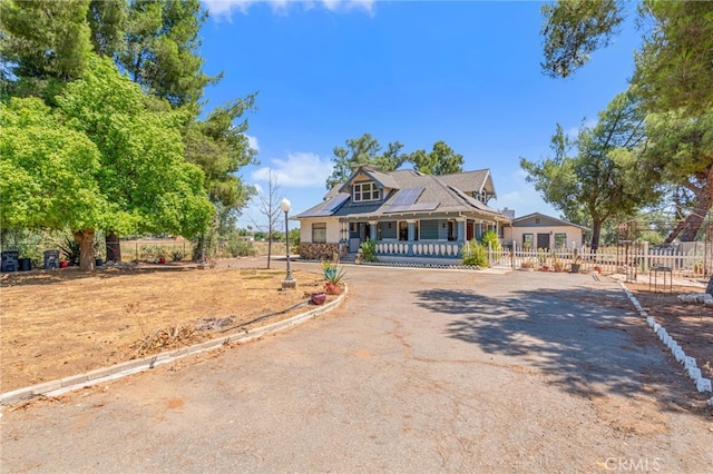 view of front of home featuring covered porch