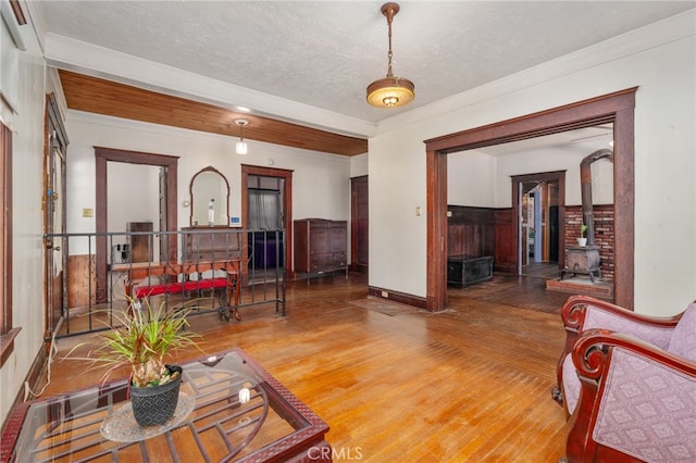 living room featuring a textured ceiling and hardwood / wood-style flooring