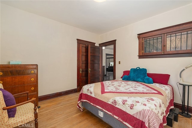 bedroom featuring hardwood / wood-style flooring