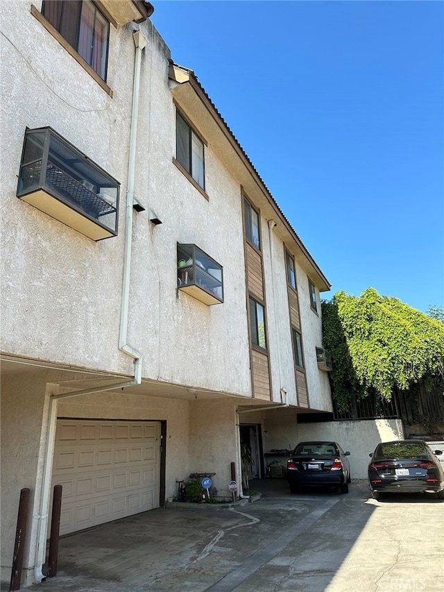 view of building exterior with a garage