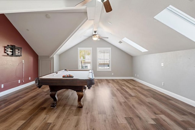 playroom featuring wood-type flooring, lofted ceiling with skylight, ceiling fan, and billiards