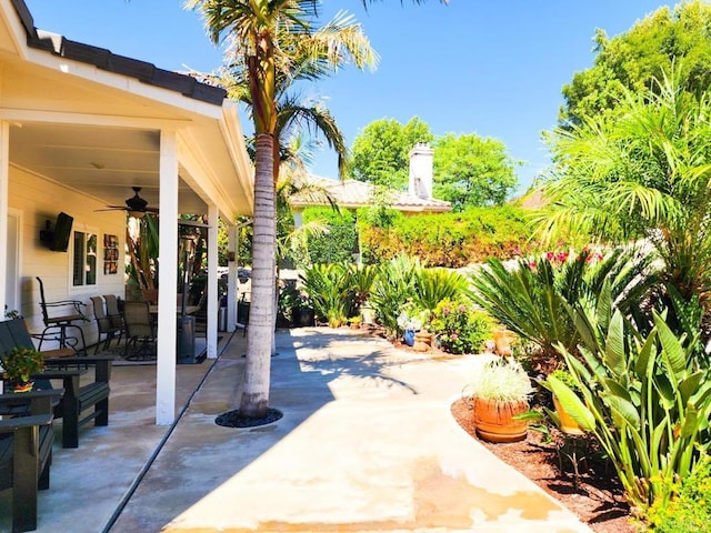 view of patio featuring ceiling fan