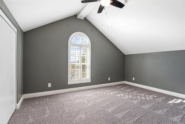 bonus room with vaulted ceiling with beams, ceiling fan, and carpet