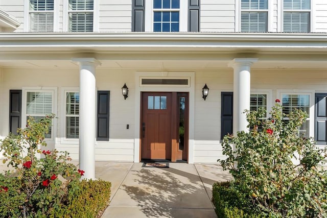 entrance to property with a porch