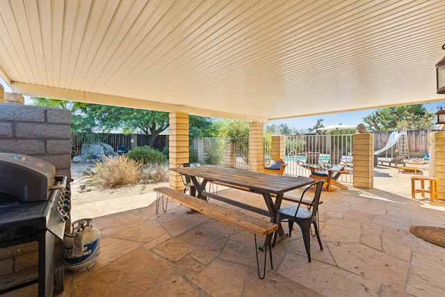 view of patio with a grill