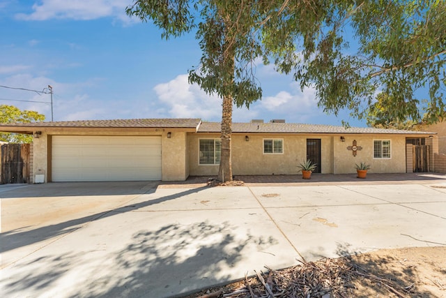 single story home with a garage