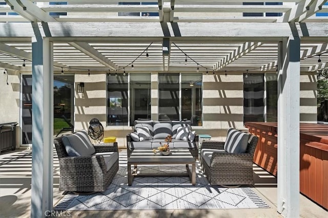 view of patio / terrace featuring a pergola and an outdoor hangout area