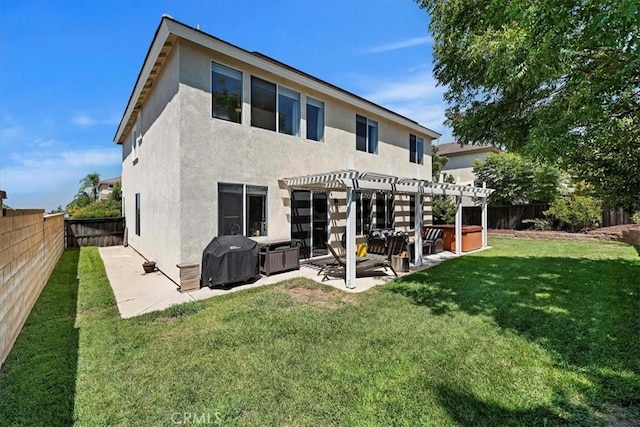 rear view of house with a patio area, a fenced backyard, a yard, and a pergola