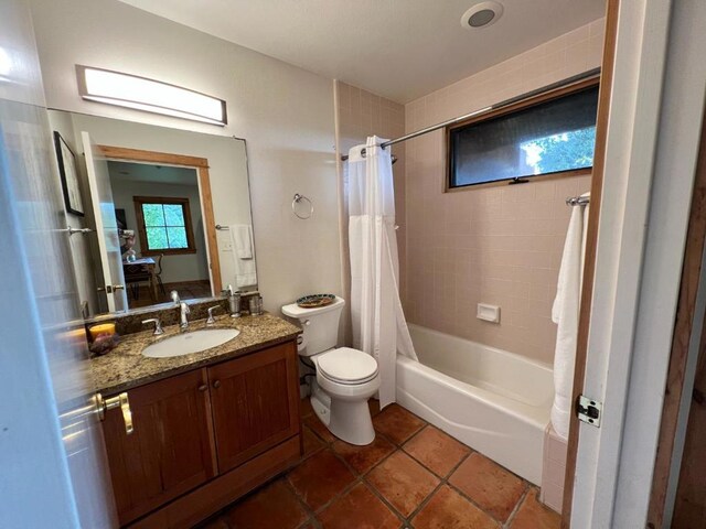 full bathroom featuring shower / bathtub combination with curtain, vanity, and toilet