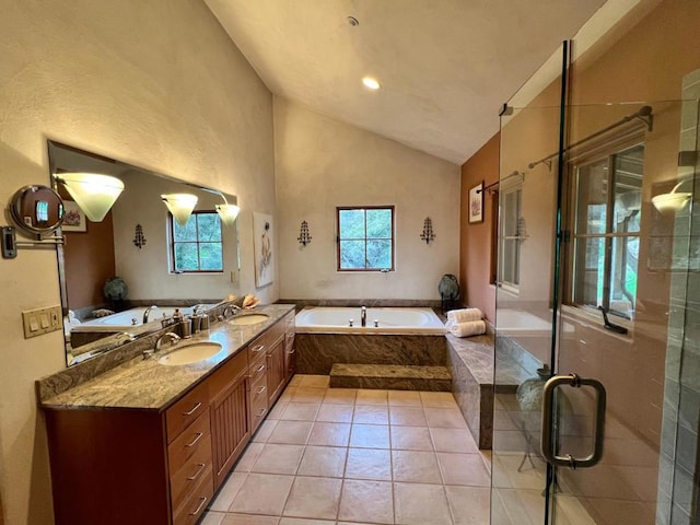 bathroom with lofted ceiling, tile patterned flooring, a wealth of natural light, and plus walk in shower