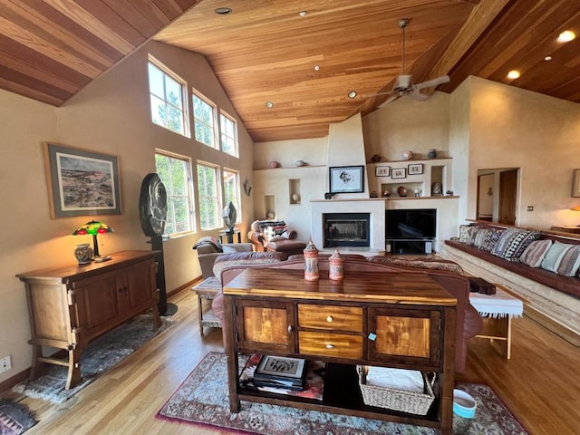 living room with wood ceiling, ceiling fan, high vaulted ceiling, and light hardwood / wood-style floors