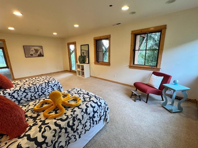 bedroom with light colored carpet