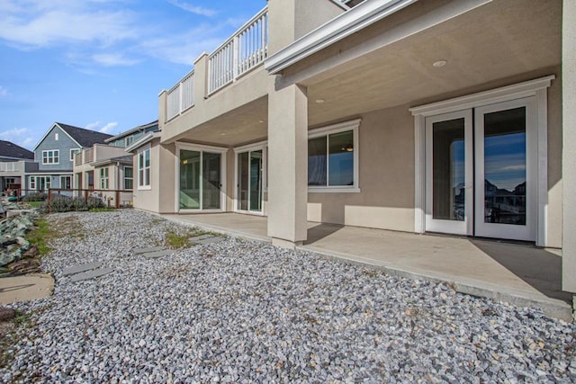 back of house with a patio area